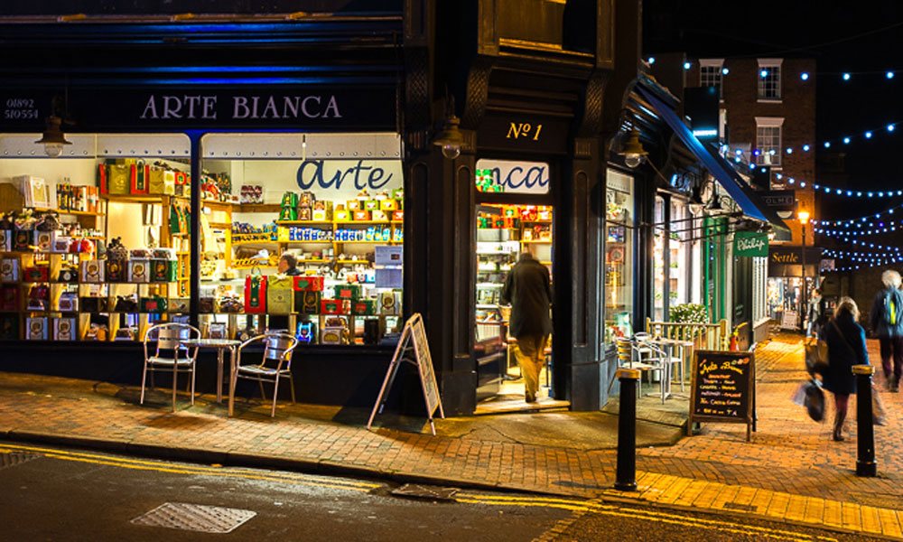 Arte Bianca Deli exterior at night