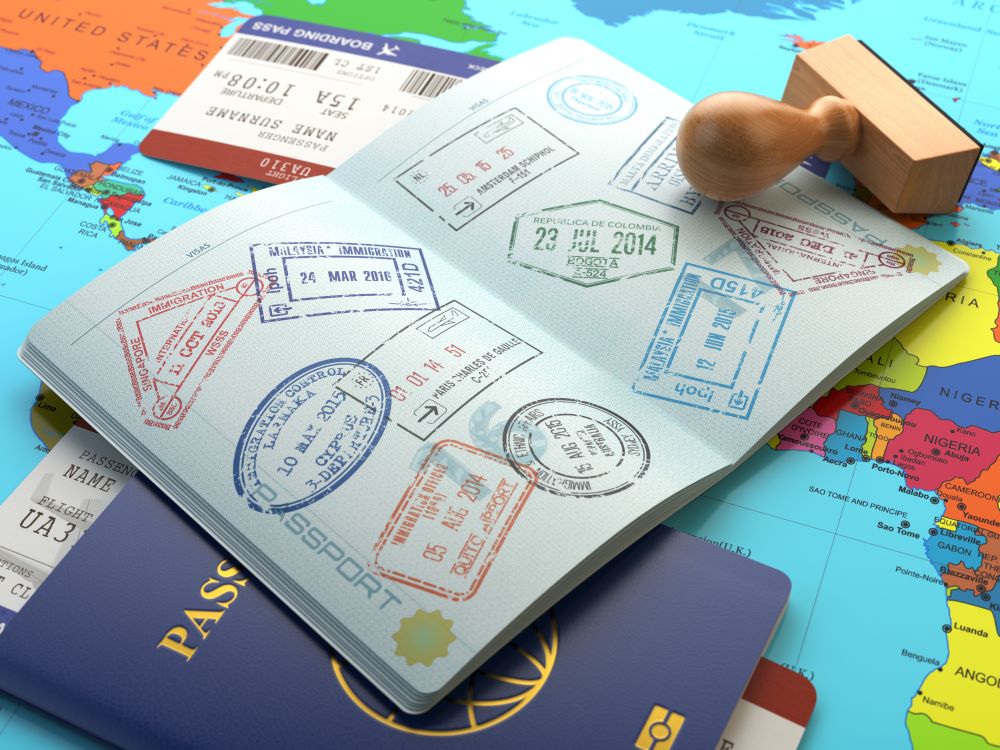 A passport with a page of stamps A passport with a page of stamps