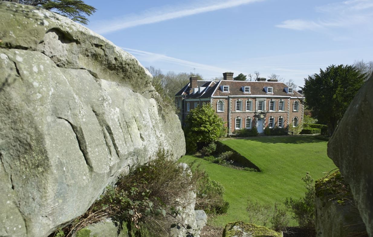 18th-century redbrick house, built for the family of William Penn of Pennsylvania sat next to huge sandstone rocks