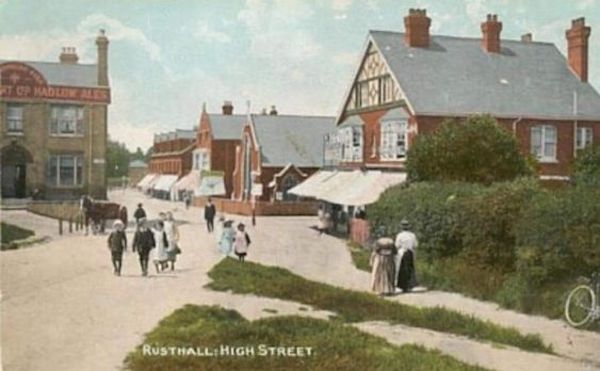 Rusthall A historical image of Rusthall High Street showing numerous buildings and people
