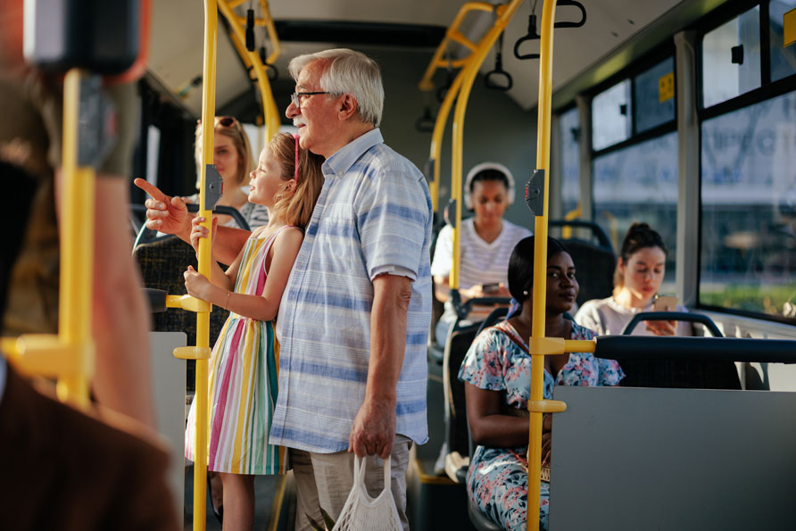 People-on-a-bus A grandfather and granddaughter on a bus