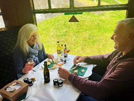 dining on board spa valley A couple dinning on the heritage train