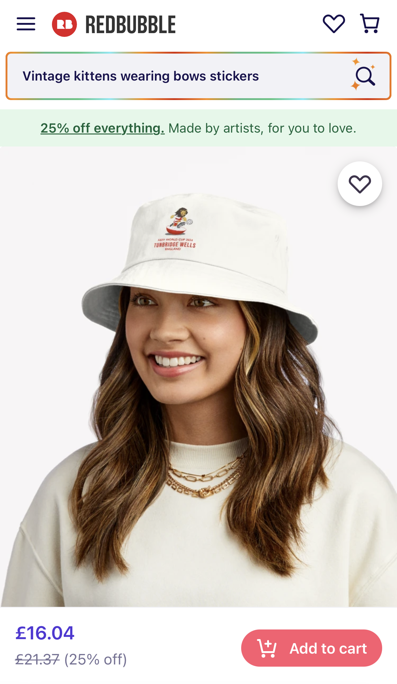 Subbuteo merch1 A lady wearing a white bucket hat with a subbuteo logo on it