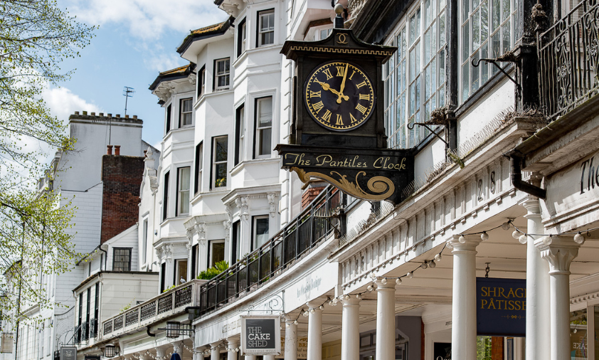 Pantiles clock Clock hanging off the side of a building