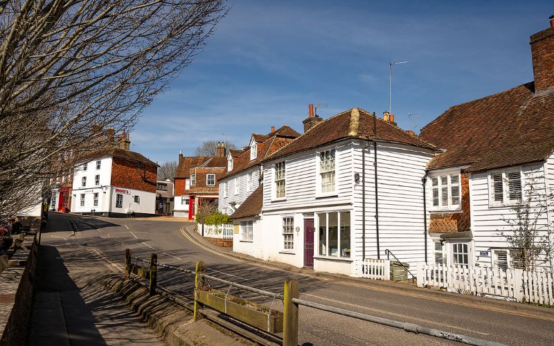White houses on hilly street
