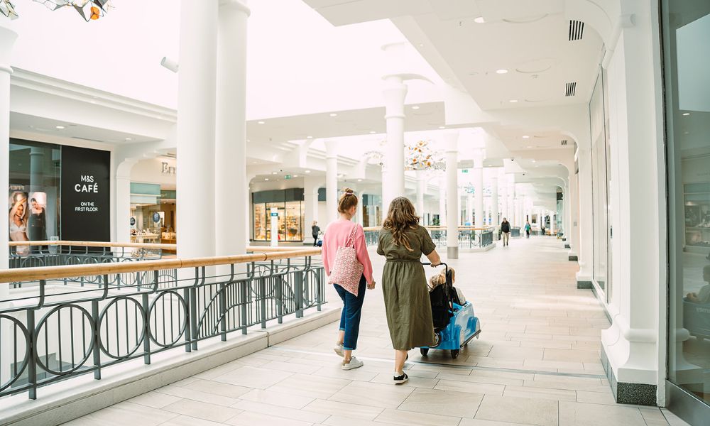 Family walking through shopping centre